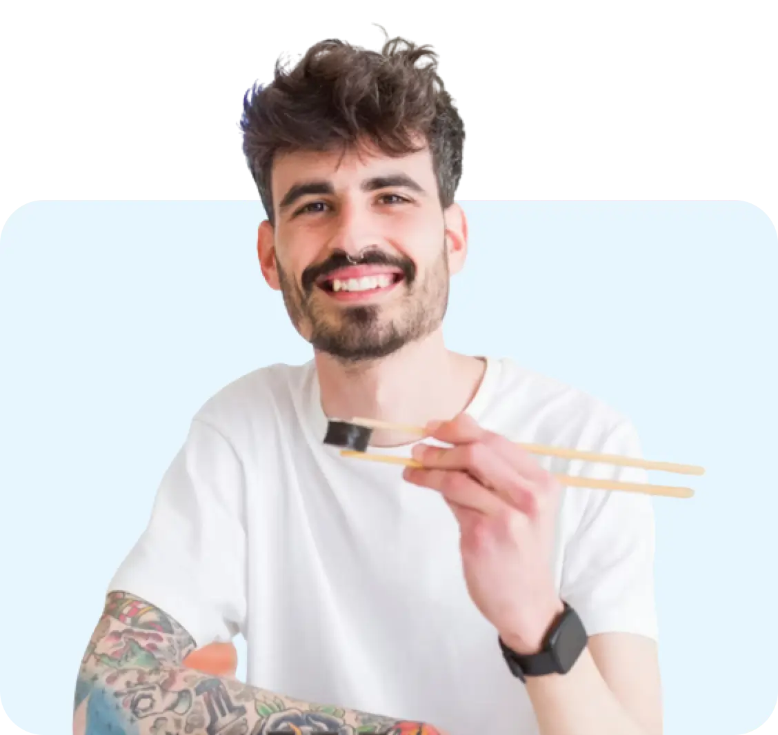 'a man eating sushi